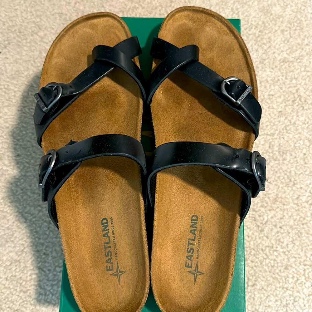 Women’s black Eastland sandals size 11. Never worn.